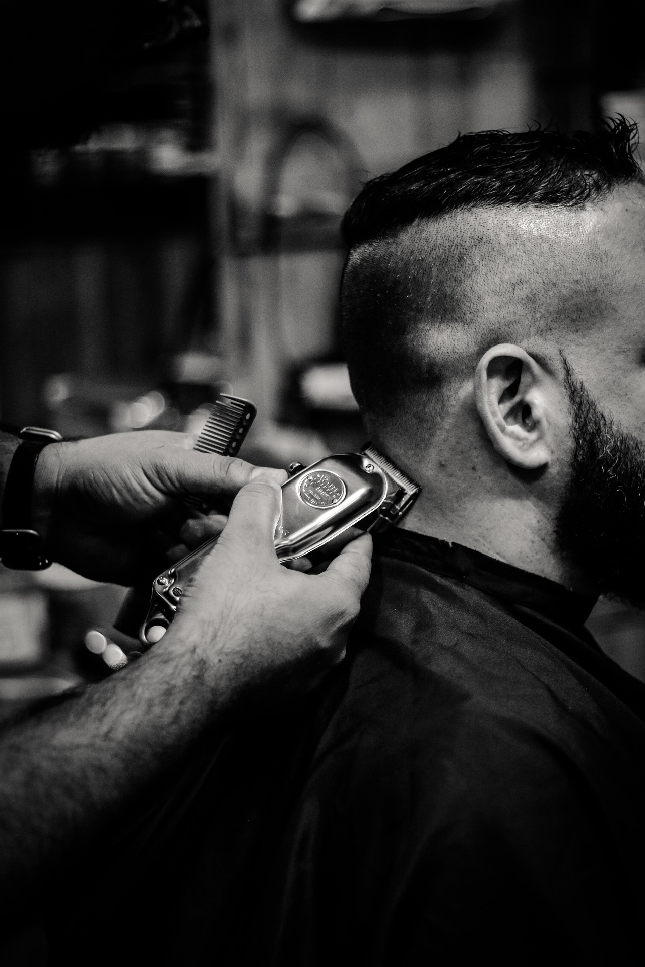 Barber styling a client
